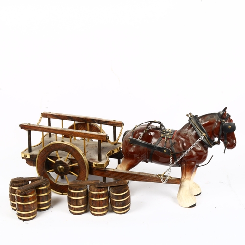 437 - A large ceramic Shire horse with barrel cart