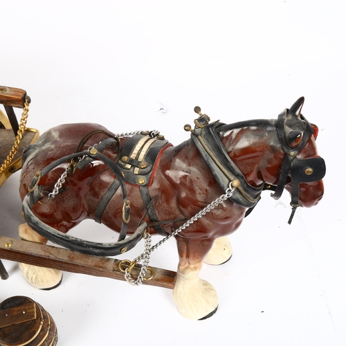 437 - A large ceramic Shire horse with barrel cart