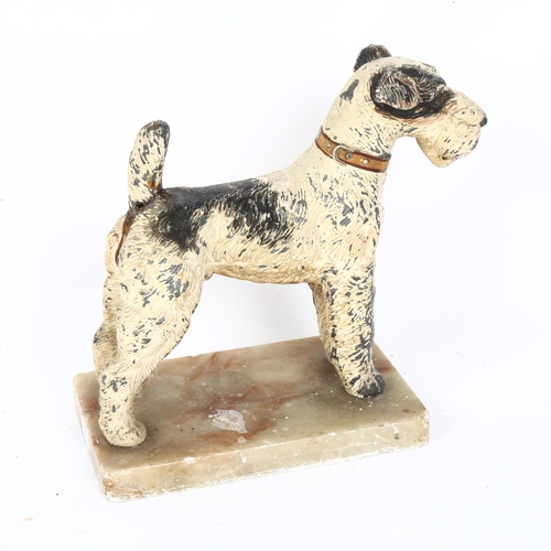 440 - A painted spelter Schnauzer dog sculpture, on onyx base, length 19cm (tail A/F)