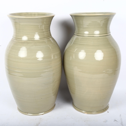 455 - A large pair of French celadon glaze baluster vases, signed, height 40cm