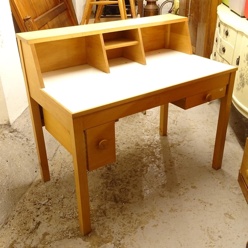 2510 - A mid-century pine writing desk, W 107cm, H 94cm, D 60cm