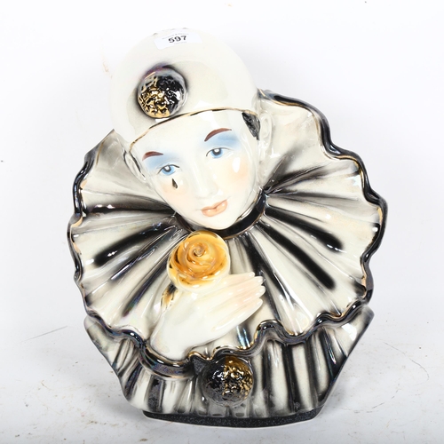 597 - A porcelain bust of Pierrot, 35cm