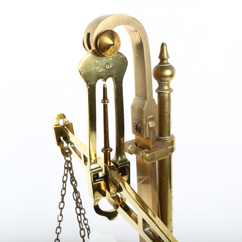 694 - A brass balance scale, height 54cm