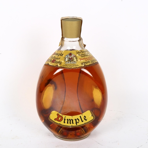 472 - A rare numbered 1970's Haig dimple Whisky