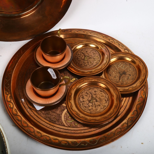 860 - An 18th century Middle Eastern copper bowl, a pair of Lenk copper and enamel teacups and saucers, a ... 