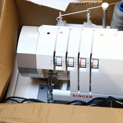 868 - A portable Singer overlock electric sewing machine, 14SH754