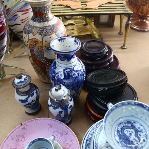 871 - Oriental porcelain plates, vases, and Chinese wooden vase stands