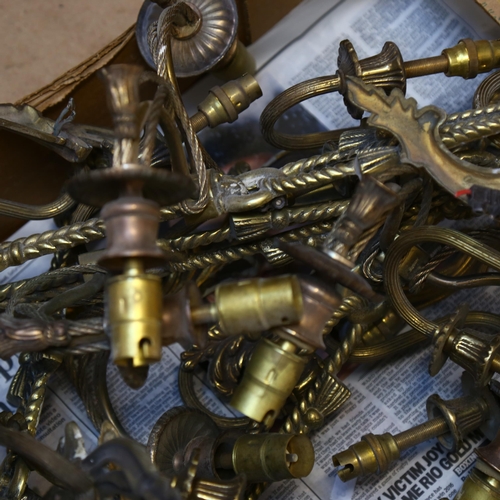 904 - A boxful of decorative brass wall sconces