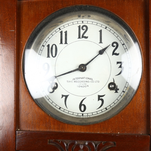 917 - A mahogany-cased wall clock, by The International Time Recording Co, made in USA, height 76cm