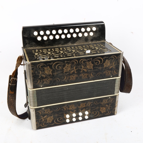 932 - A German concertina, width 28cm