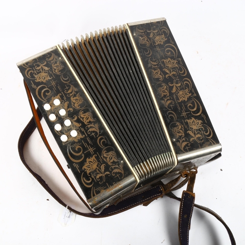 932 - A German concertina, width 28cm