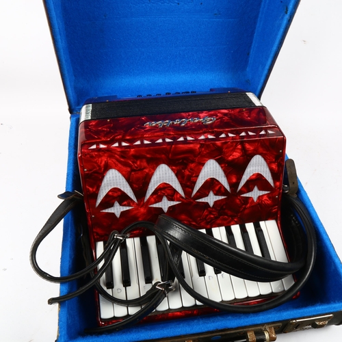 933 - A Galotta piano accordion, width 32cm, in case