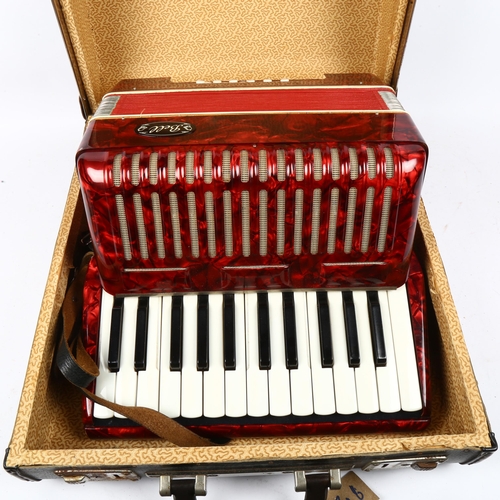 934 - A Bell piano accordion, width 31cm, in case