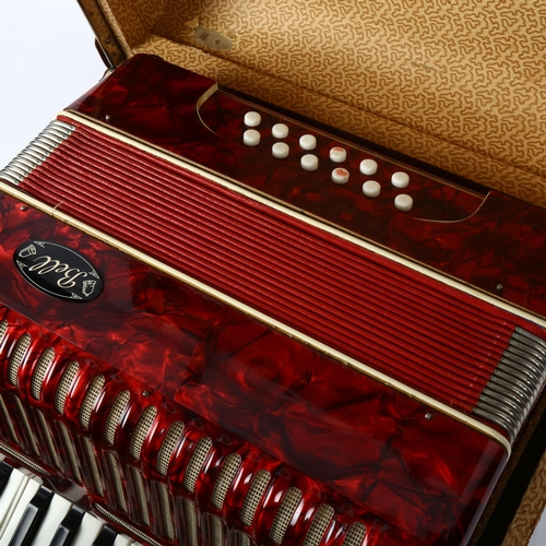 934 - A Bell piano accordion, width 31cm, in case