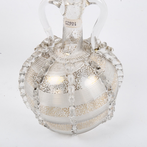 951 - A Venetian hand blown and gilded glass decanter and stopper, height 33cm (neck A/F)