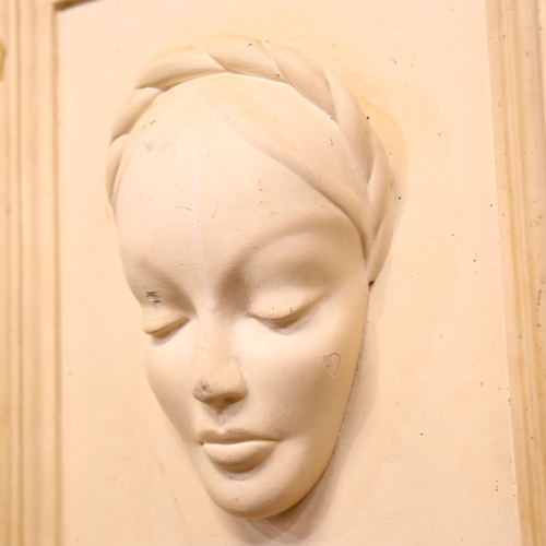 976 - A cream painted plaster death mask, framed, overall 44cm x 35cm