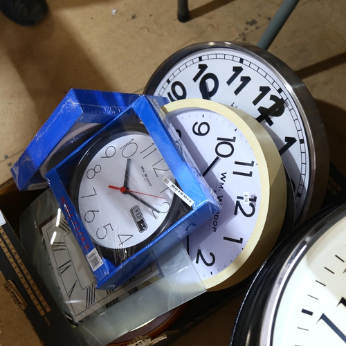 996 - A quantity of new quartz wall clocks, largest 53cm