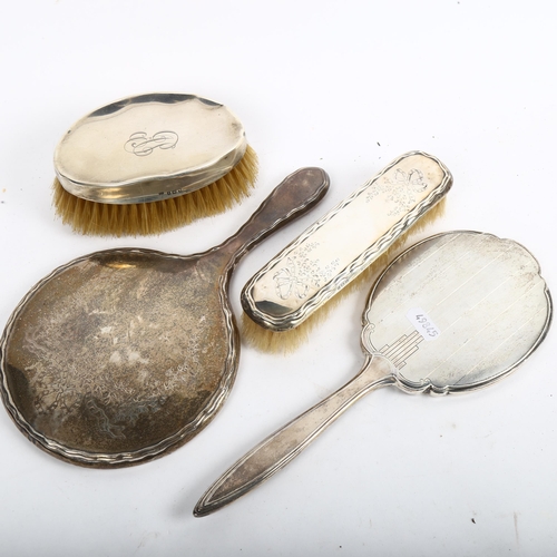 1063 - Silver dressing table items, including hand mirrors and clothes brush