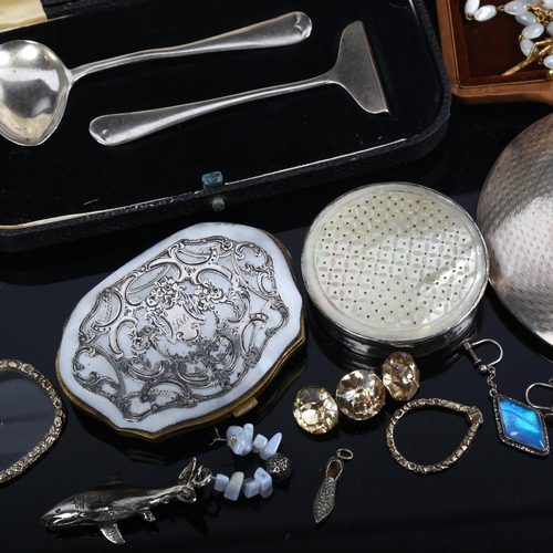 1100 - A baby's silver pusher and spoon set, silver dressing table jar mirror, mother-of-pearl purse etc