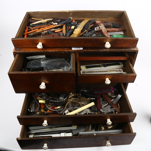 1108 - A Vintage watchmaker's table-top tool chest, containing a quantity of wristwatch straps