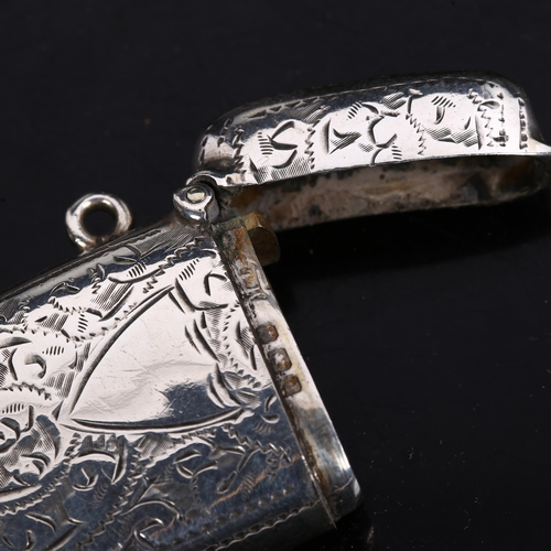 1115 - A small late Victorian curved silver Vesta case, allover engraved foliate decoration, hallmarks Birm... 