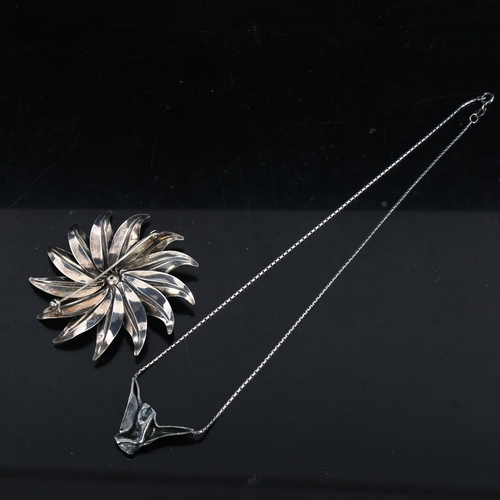 1125 - NIELS ERIK FROM - a large Vintage Danish sterling silver floral brooch, and a fold pendant necklace ... 