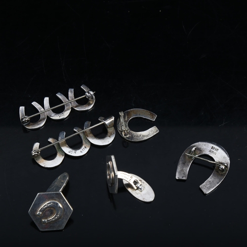 1144 - Silver lucky horseshoe jewellery, including cufflinks and brooches (6)