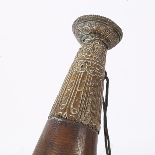 166 - A brass-mounted horn powder flask, relief embossed decoration, length 35cm