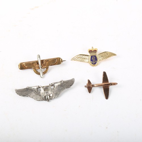 318 - A Second World War Period US Airforce aerial gunner wings brooch, similar propeller and wings brooch... 