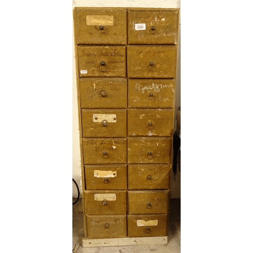 2701 - A bank of 16 pine-fronted drawers, W39cm, H102cm, D24cm