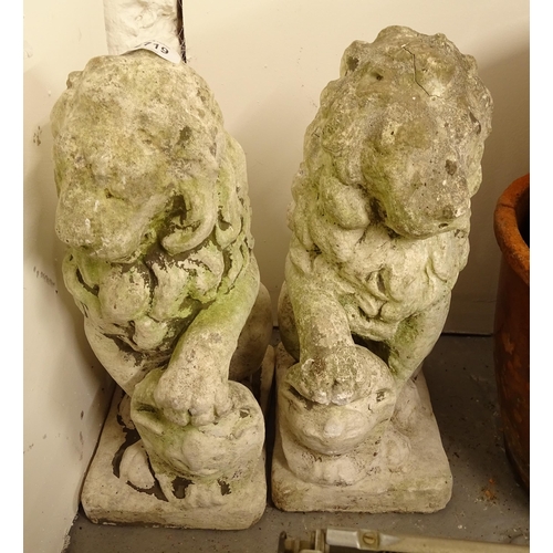 2719 - A pair of weathered concrete lion garden statues, H40cm