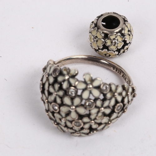 1184 - A Pandora style white enamel daisy ring and matching charm (2)