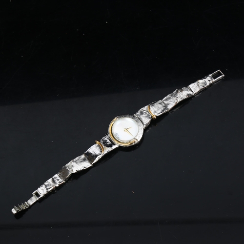 1197 - FLORA DANICA - a Danish stylised silver quartz wristwatch, working order