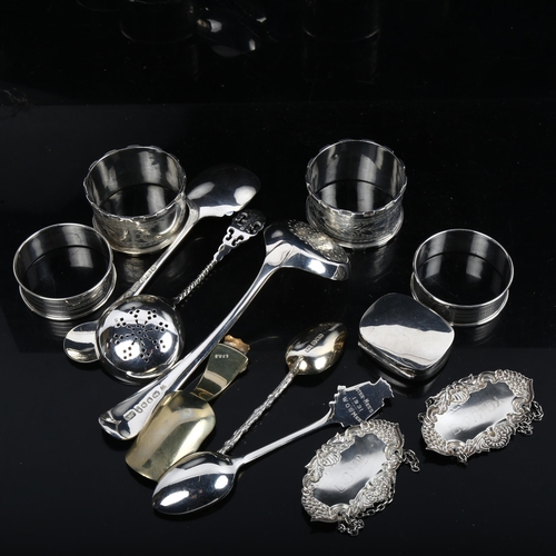 1243 - Various silver, including sifter spoon, napkin rings, decanter labels, and 2 small silver plated spo... 