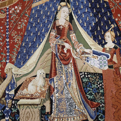 614 - A tapestry wall hanging, depicting mother and child, width 140cm