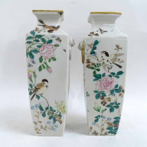 207 - A pair of Japanese hand painted square-section vases, bird decoration with lion ring handles, charac... 