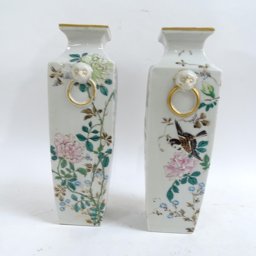 207 - A pair of Japanese hand painted square-section vases, bird decoration with lion ring handles, charac... 