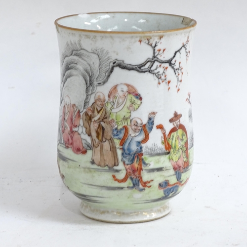 274 - A Chinese famille rose hand painted and enamelled porcelain 'nine sages' mug, height 11cm, restored