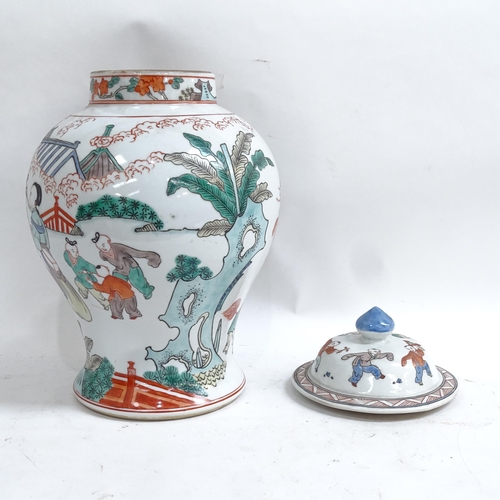 348 - A large Chinese porcelain jar and cover, with painted figures, height 40cm, and a smaller Chinese Im... 