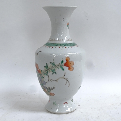 359 - A Chinese famille verte porcelain baluster vase, hand painted floral decoration, height 24cm, on har... 