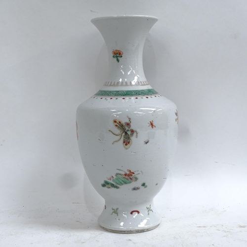 359 - A Chinese famille verte porcelain baluster vase, hand painted floral decoration, height 24cm, on har... 