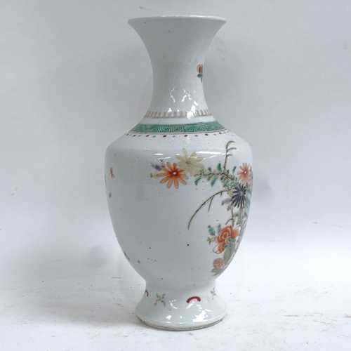 359 - A Chinese famille verte porcelain baluster vase, hand painted floral decoration, height 24cm, on har... 