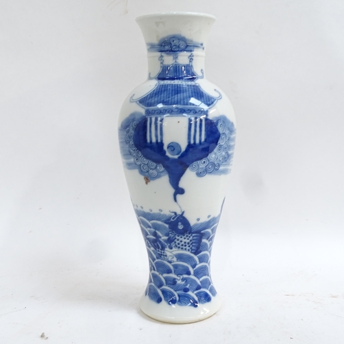 360 - A Chinese blue and white 'Temple' baluster vase, 4 character mark on base, height 29cm