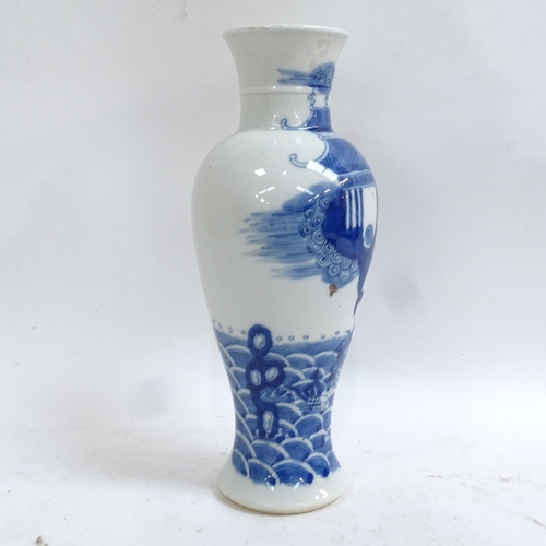 360 - A Chinese blue and white 'Temple' baluster vase, 4 character mark on base, height 29cm