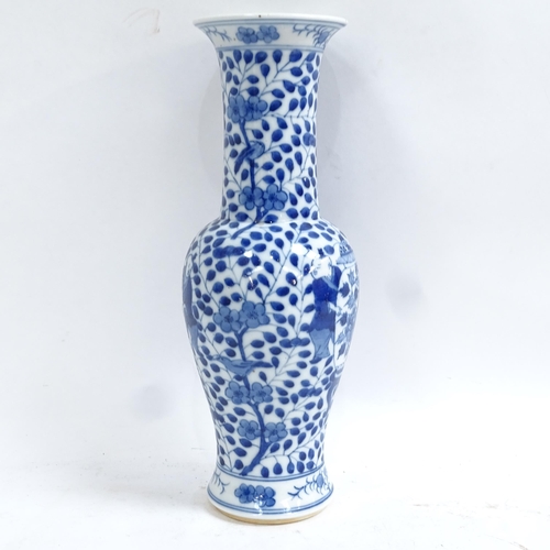 364 - A Chinese blue and white beaker vase, figural and floral decoration with jars, height 31cm