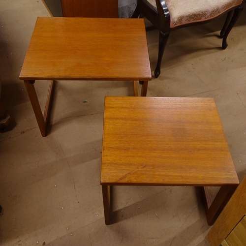 2233 - An unusual mid-century teak coffee table, with fold over top, integrated nest of 2 tables, and a dro... 