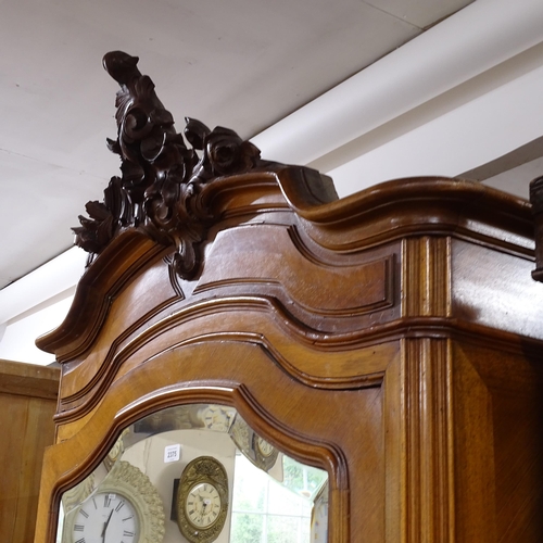 2375 - An Antique French walnut armoire, with bevel-glaze door and fitted with adjustable shelves, W100cm, ... 