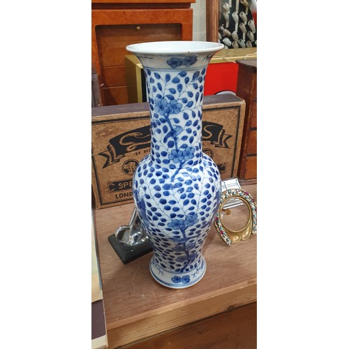 364 - A Chinese blue and white beaker vase, figural and floral decoration with jars, height 31cm