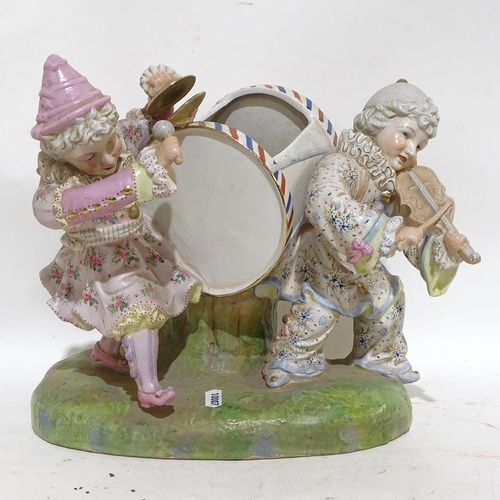 459 - A large Continental porcelain musician group, a pair of French porcelain figures, German beerstein e... 