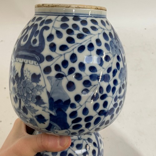 363 - A Chinese blue and white double-gourd vase, figural and floral decoration with jars, height 29cm